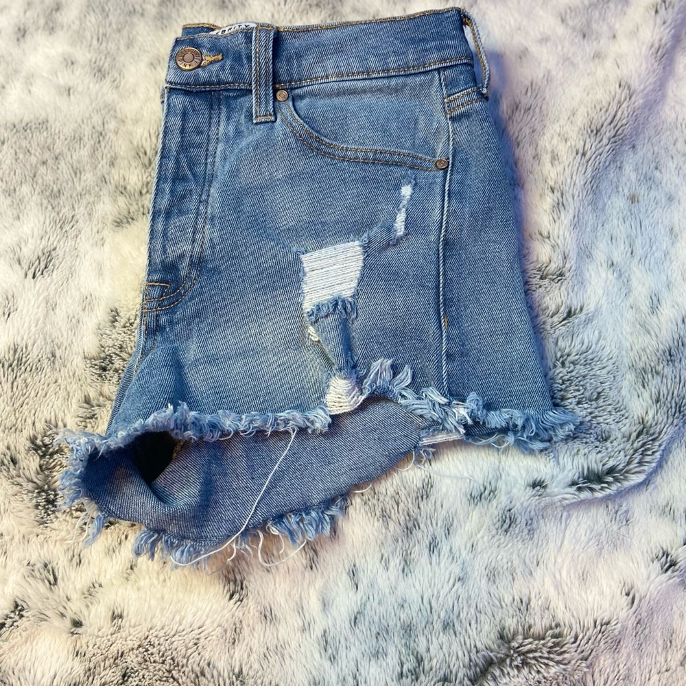 Celebrity pink ripped shorts